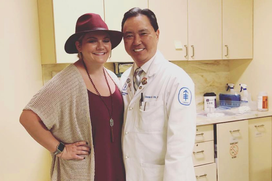 Young woman posing with doctor