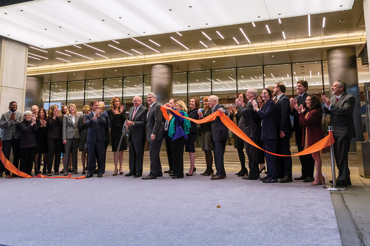 Group of people at ribbon-cutting ceremony