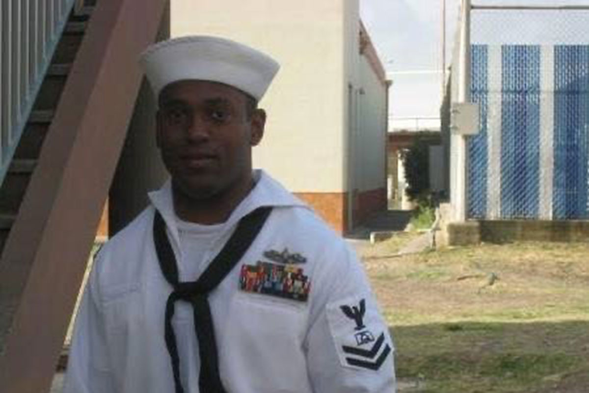 Matthew in his white Navy uniform