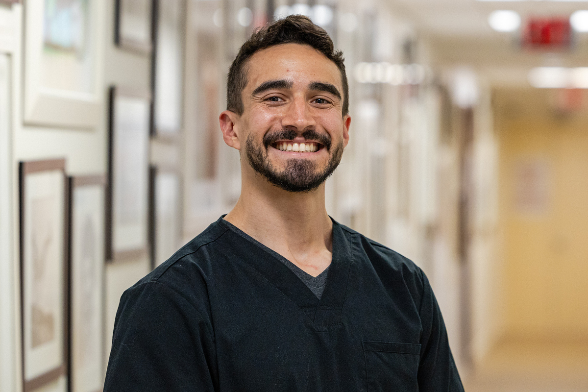 MSK Acupuncturist Charles Rico seen smiling in hallway 