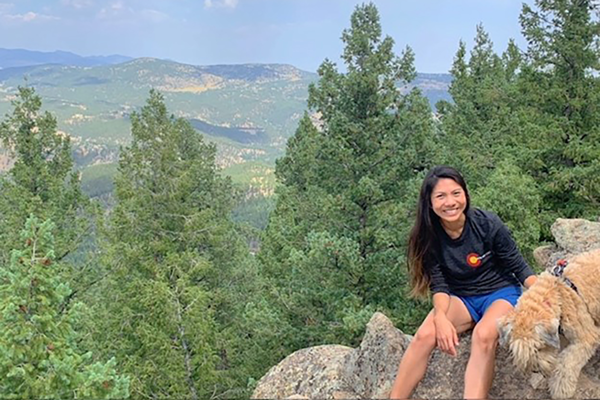 Young woman on mountain.