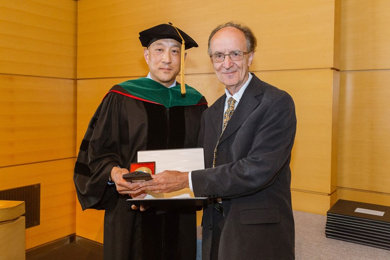 Andrew Kung with pediatric leukemia researcher Melvyn Greaves
