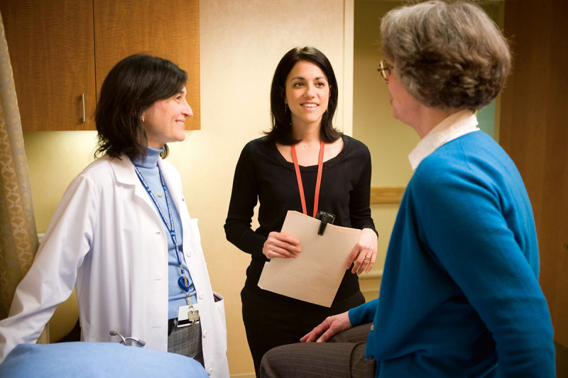 Patient talking to medical professionals