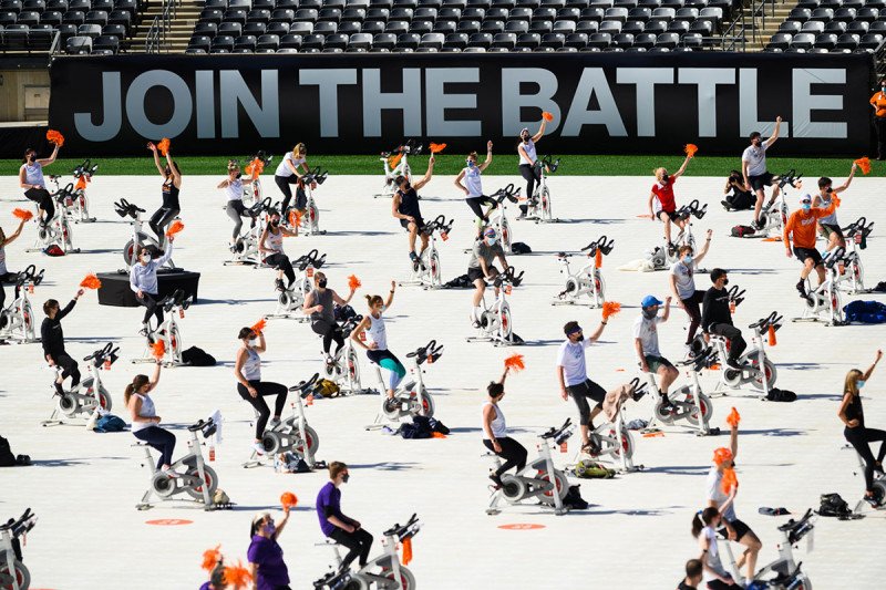 A crowd of people on stationary bicycles at the Cycle for Survival event at MetLife Stadium