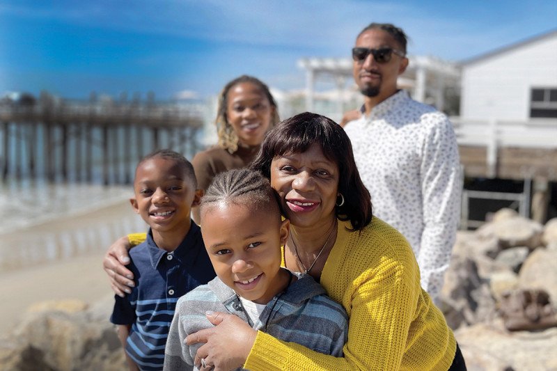 Ilene Thompson with her family on the beach