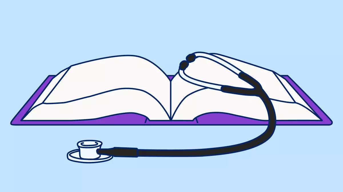 A stethoscope rests on top of an open reference book.