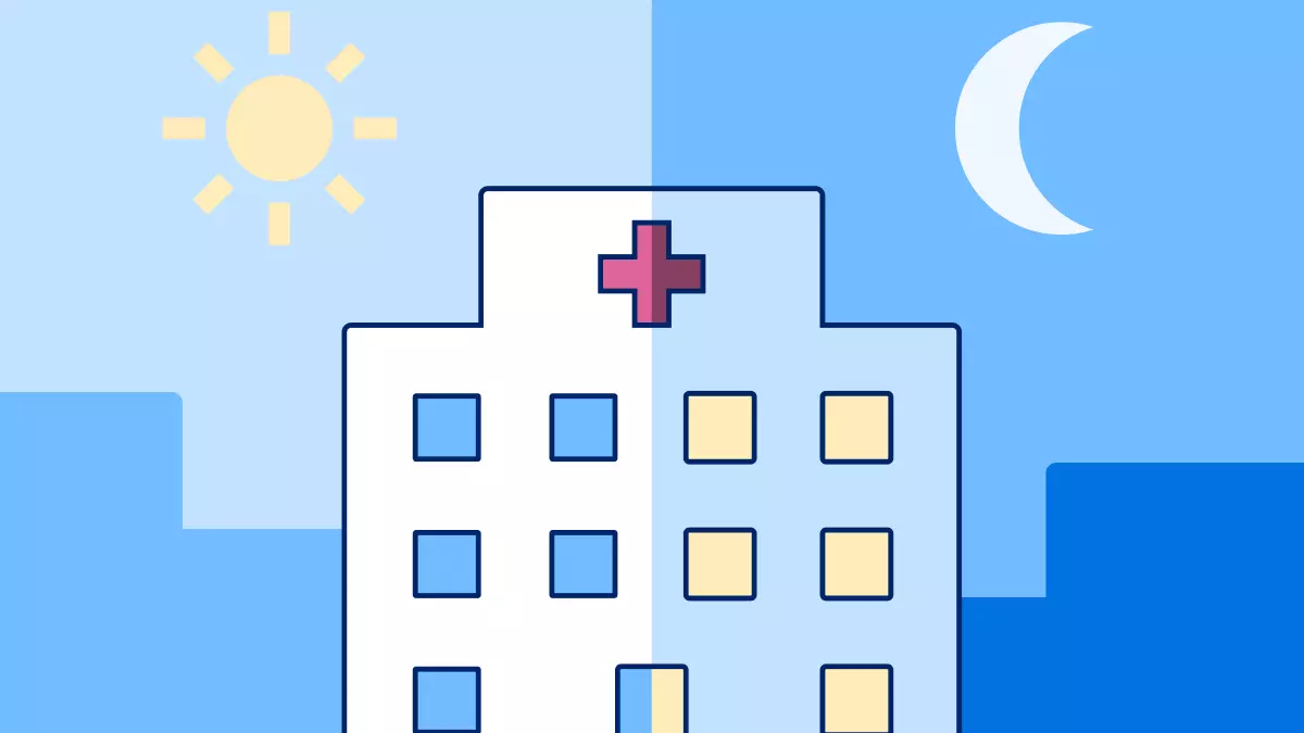 A building with medical cross, half in daytime and half in nighttime.