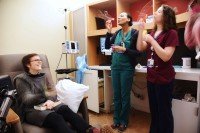 Asha blowing bubbles at last treatment