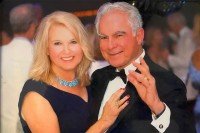 Alan and Sandra Gerry wearing formalwear and smiling at the camera.