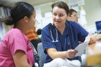 Two nurses talking to each other