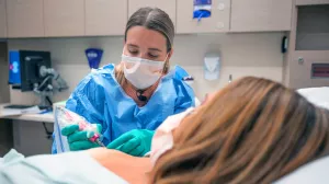 An MSK physician assistant does a nipple tattoo procedure.