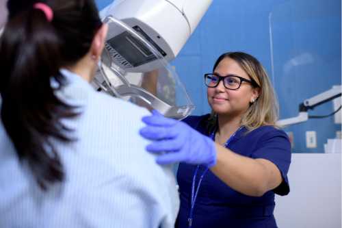 MSK expert administering mammogram