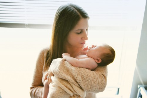 Woman holding infant